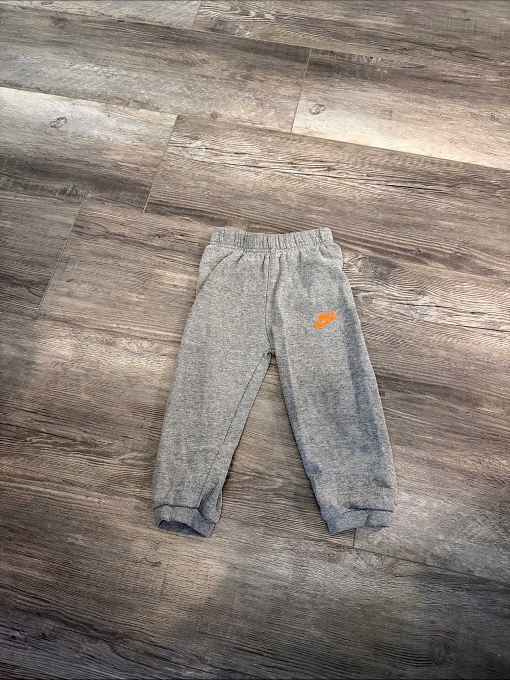 Nike Kids Gray Sweat Joggers with Orange Logo